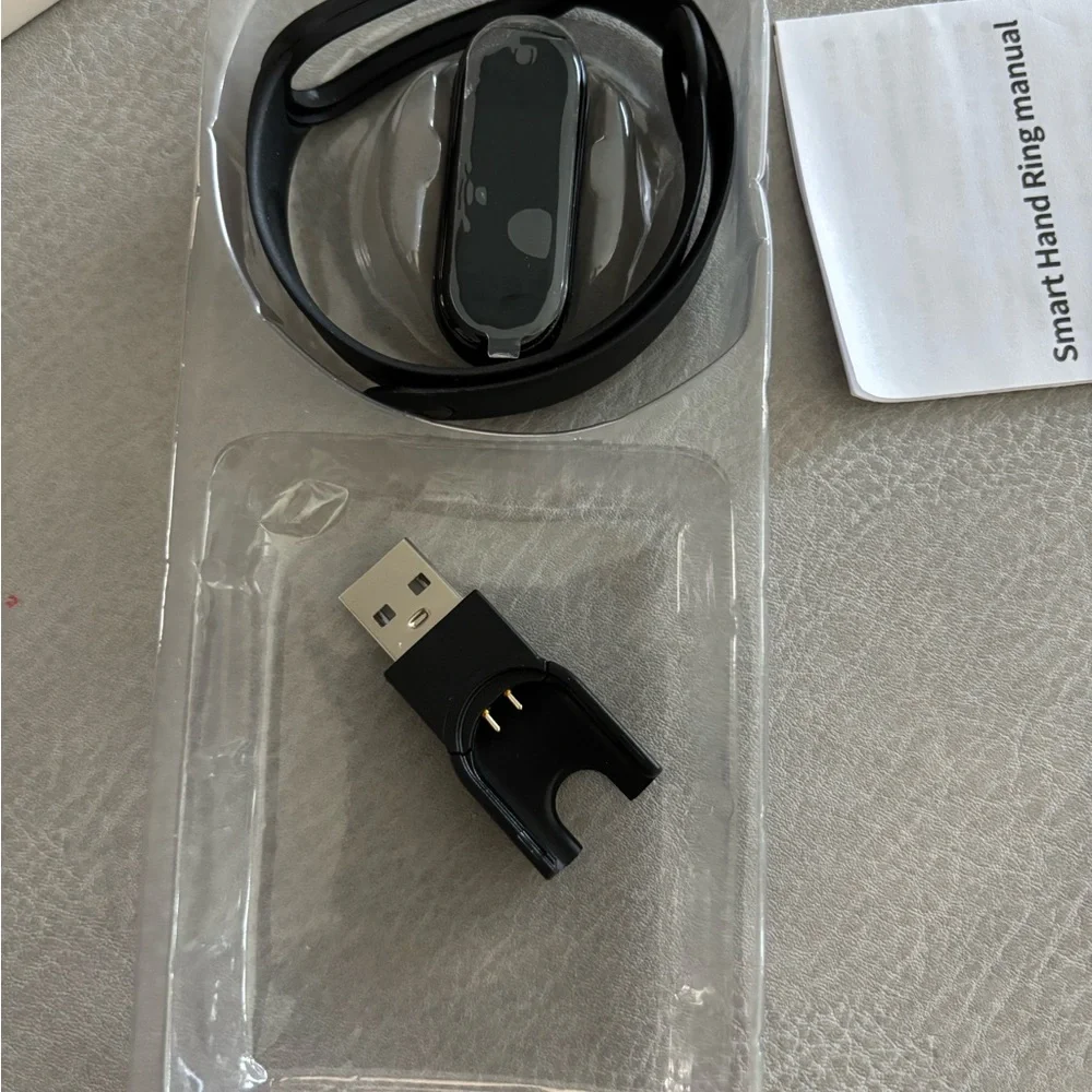 Black Fitness Tracker with Sleek Design and Wristband